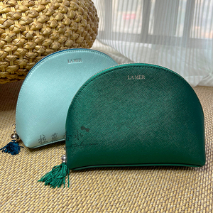 海蓝之谜墨绿色湖蓝贝壳化妆包半圆收纳包旅行携带方便质感手拿包