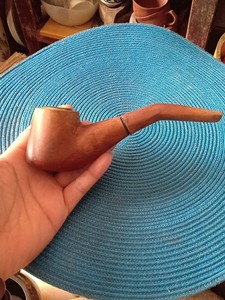 一个有些年份的烟斗 烟嘴，实木的挺特殊，比较有意思，正常使用