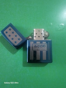 出售Zippo打火机，有划痕，有磕碰，打火的那个转轮整不动了