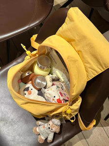 小众可爱纯色奶油黄双肩包百搭大容量休闲简约男女通用款手提包包