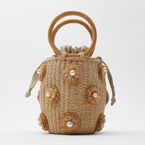 草编包ZA新款女包人造珍珠装饰手提篮式包桶包编织包花朵藤条抖音