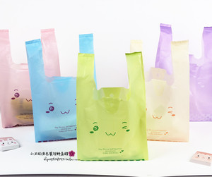 可爱笑脸超市购物塑料背心袋礼品手提胶袋包装马甲马夹袋 100个