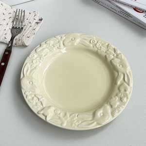 法式奶油黄盘子陶瓷浮雕兔兔盘纯色圆形餐盘