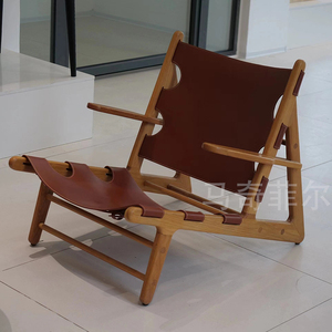 设计师休闲沙发椅北欧实木狩猎椅轻奢马鞍皮躺椅创意民宿中古椅子