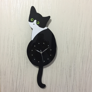 创意摇尾猫咪挂钟可爱卡通摇摆尾巴猫型钟表时尚个性静音石英钟