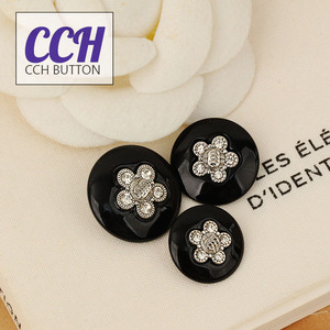 CCH纽扣 黑色树脂底托金属白叻色花朵水钻款扣子 18 20 22mm陈