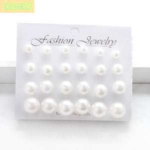 new 12 pair Earrings large small pearls sitting in rows stud