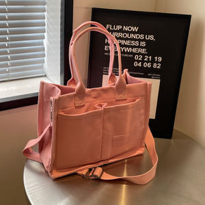 粉色口袋帆布包包女2024新款大容量休闲托特包学生上课通勤斜挎包