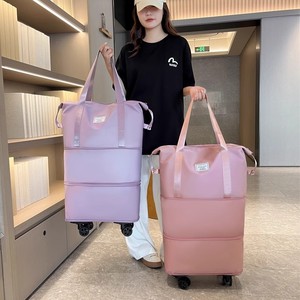 日本万向轮旅行包女大容量行李袋旅游短途收纳双层带滑轮托运包
