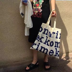 芬兰小众超大容量帆布包环保购物袋妈妈时尚包旅行袋折叠简约字母