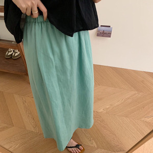 蓝绿色棉麻半身裙女夏季松紧腰设计感开叉直筒透气中长款A字裙子