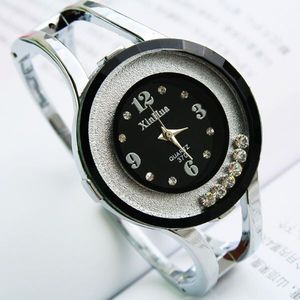 时尚韩版女士手镯表高品质女表时装表手链表创意个性流动水钻手表