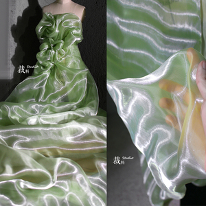 绿水光液态高光神仙布料反光网纱透明亮光汉服礼服网纱设计师面料