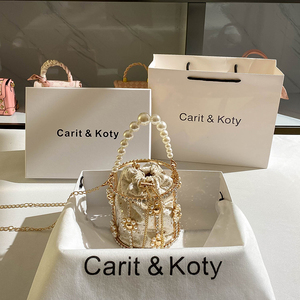 Carit Koty高级感水钻圆筒包包2024新款法式小众珍珠链条包女爆款
