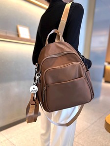 DISK NEW STYIE BACKPACK潮品轻奢多口袋旅游背包牛津布双肩包女