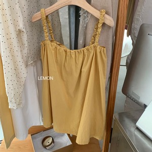 广州十三行韩国货女装鹅黄色娃娃上衣设计感后背绑带吊带小衬衫夏