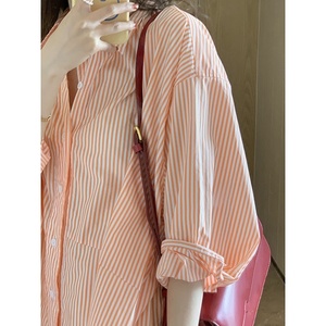 高级感夏季蜜橙色防晒条纹衬衫简约休闲中性宽松型薄款衬衣女外穿