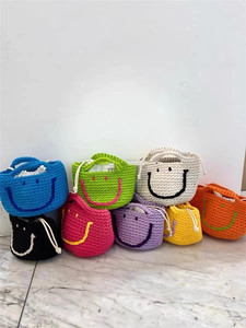 泰国小众设计师品牌可爱糖果色笑脸smile洋气时髦手工编织手提包
