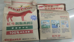 台湾代购红牛脱脂高钙奶粉REDCOW1400g即溶好冲泡子母袋纽西兰