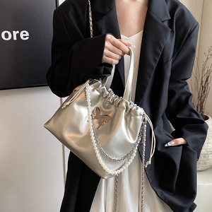 银色蝴蝶双肩包包女式2024新款百搭时尚韩国珍珠背包气质手提包潮