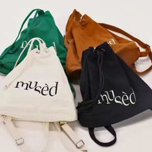7bao韩版新款双肩背包简约字母印花帆布包手提大容量学生水桶包潮