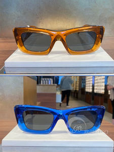 Prada普拉达代购女士5.8折 棕色/宝蓝色侧边三角标粗框太阳镜墨镜