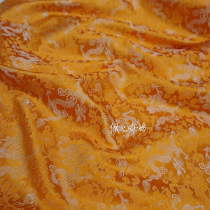 桔黄色金黄色橘色满地小龙织锦缎布料中式宋锦面料丝绸缎子面料