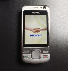 诺基亚手机6600i，不锈钢外壳滑盖手机，怀旧古董手机