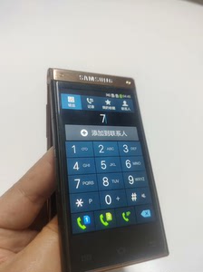 闲置的三星W2014翻盖智能双卡双屏三网大字体中老年二手手机