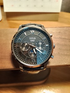 铁达时(TITUS)男士机械手表，黑色表盘，配真皮和钢两种表