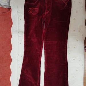 丹丝娜  微型条绒喇叭长裤   尺码29   玫红   98
