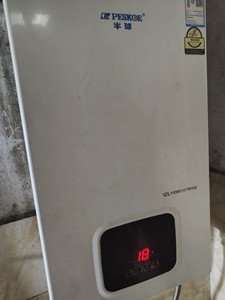 出半球燃气热水器，型号为JSQ24-12L1，额定燃气流量为