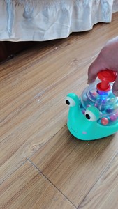 美国B.Toys蜗牛按压跳跳球巴布扭扭宝宝益智儿童感统玩具发