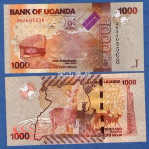 全新UNC 非洲 乌干达2010版1000先令独立纪念碑世界美纸币