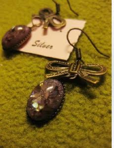 韩版贝母耳环（紫色）韩版母贝耳环（紫色）蝴蝶结宽2CM很有味