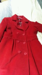 圣迪奥蕾丝蝴蝶结大衣正红色冬装外套，甜美款，下摆裙型，袖口腰