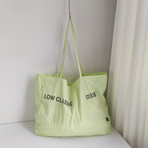 黄色大容量帆布包包女2024年新款小众手提单肩环保袋子LOWCLASSIC