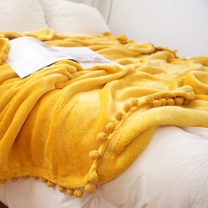 纯色流苏球球法兰绒毛毯ins网红毯办公室午睡膝盖毯装饰毯沙发毯