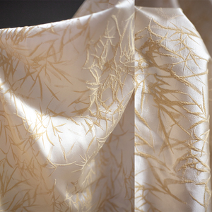 杏色竹叶子植物花卉立体提花布料复古文艺国风旗袍汉服装饰面料