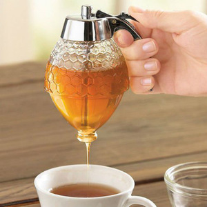 日本创意按压式蜂蜜罐挤酱瓶塑料密封罐漏斗式罐子糖浆壶洒带底座