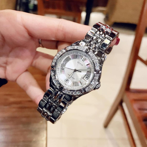 代购正品盖斯Guess手表时尚潮流水晶镶钻腕表欧美银夜光防水女表