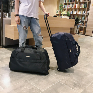 拉杆包行李袋带滑轮手提旅游包带轮子的能带上飞机的大容量行李包
