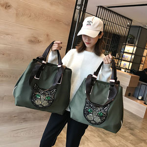 单肩包女2019韩版新款大容量手提包潮男行李袋时尚亮片猫头旅行包