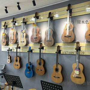 吉他挂板展示柜乐器架子上墙壁式钩琴行槽板新品广州丽丽装饰货架