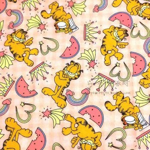 宽105 定制平纹棉布料 加菲猫粉橙色底 卡通动漫手工衬衫床单半裙