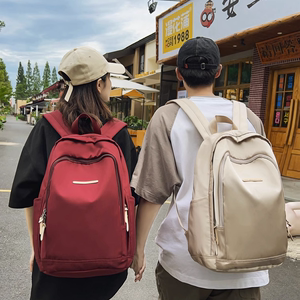 法国MKLOGY韩版大容量防水书包男女学生简约双肩包情侣旅行背包潮