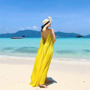 女三亚海边度假连衣裙沙滩长裙大码夏季吊带黄色露背超仙旅游海滩