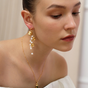 法式时髦小众个性哑光天然珍珠铃兰花不对称耳环高级长款流苏耳饰
