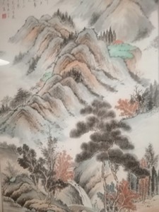 出一幅精美的中国画，描绘了美丽的山川风景。此画作采用工笔写意
