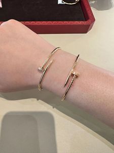 Cartier/卡地亚18K玫瑰金 JUSTE 钉子手镯头尾镶钻男女情侣款手环